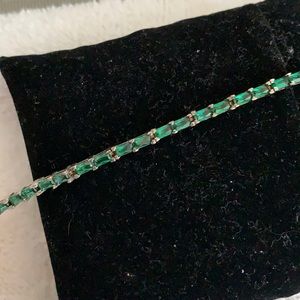 Sterling silver but I still it with green stone